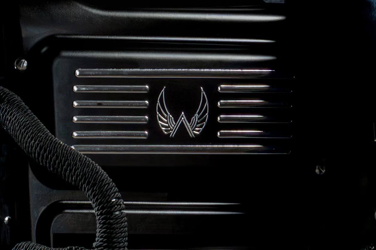 Battery cover and wing emblem